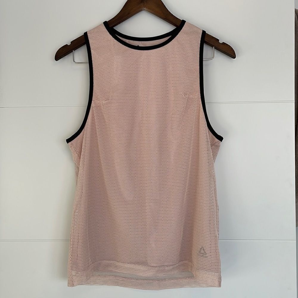 top becomes Reebok Athletic Tank Top